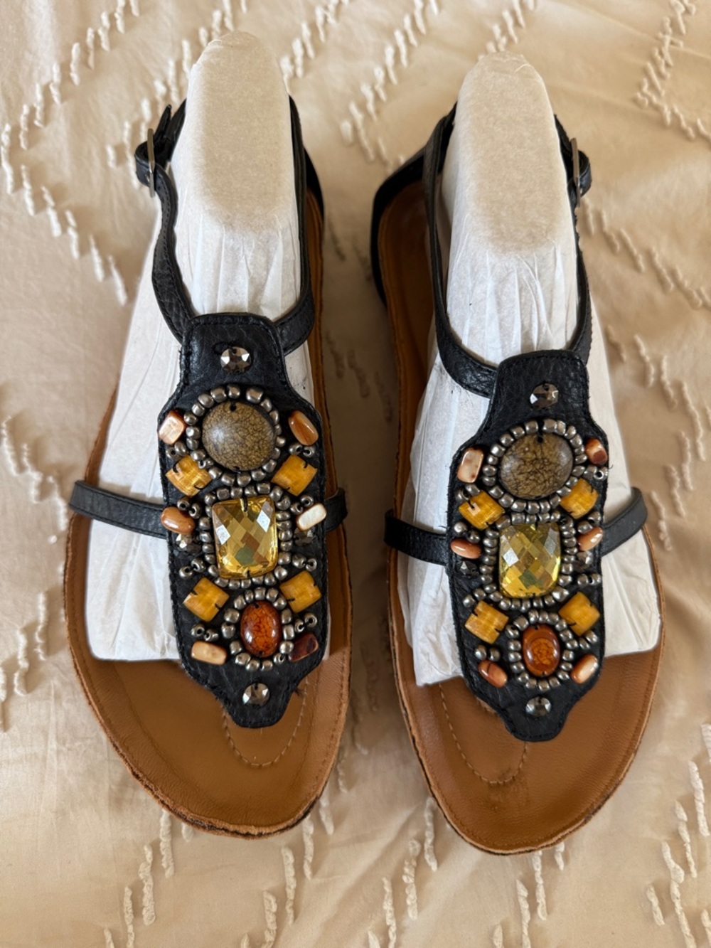 Earth shoes Black Embellished T-Strap Sandals with Yellow Gem Accents